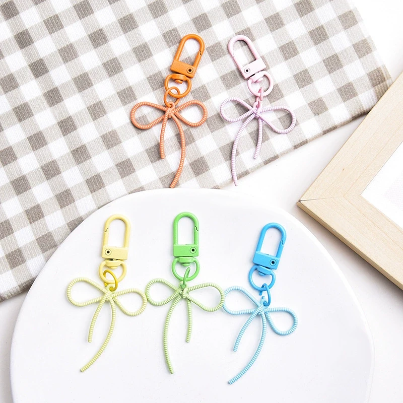 アクリルキーホルダー用金具・ストラップ・付属パーツのOEM対応写真(ribbon bow lobster clasp)